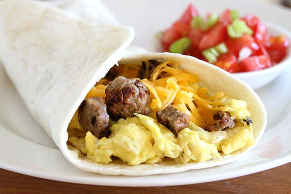 Breakfast wrap with sausage, eggs, and cheese